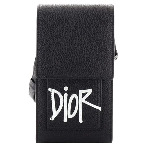 dior and shawn phone bag|Dior earbud case.